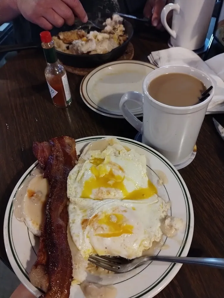 Biscuits and Gravy with 2 Fried Eggs on Top